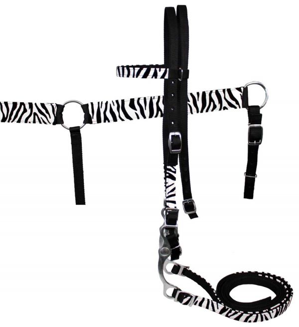 Nylon headstall with bit, reins and breastcollar set with faux white leather and felt zebra print overlay.- Horse size nylon headstall with grazing bit, reins and matching breastcollar set with faux white leather and felt zebra print overlay. Headstall comes with matching 6' reins and matching breastcollar.